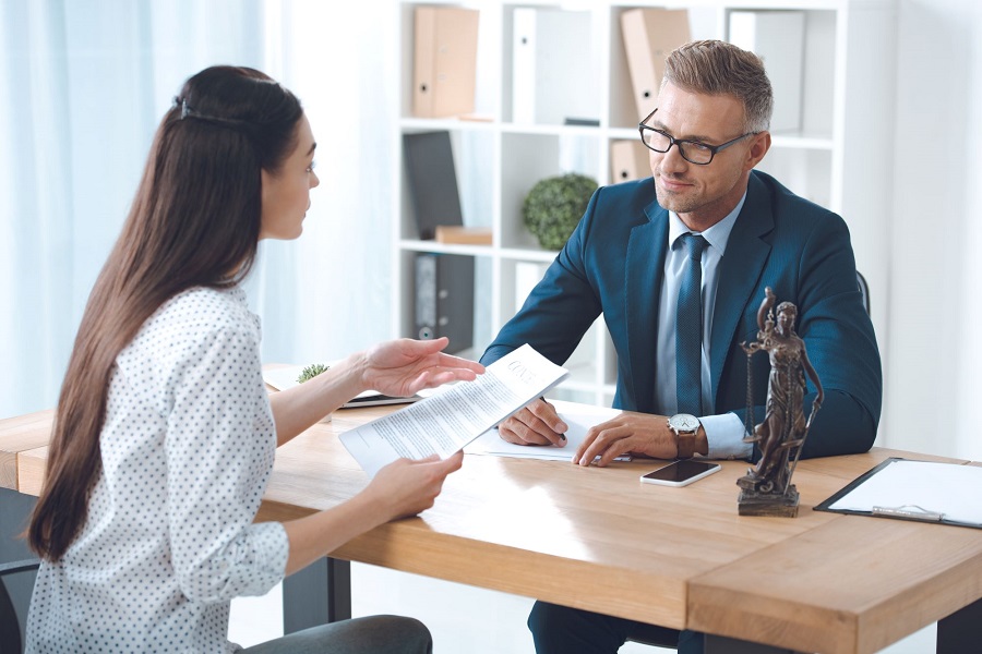 lawyer and client discussing over